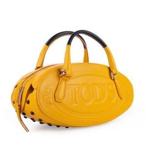 IN SEARCH OF ??? NOT SELLING 
NWT Tods mini convertible bag